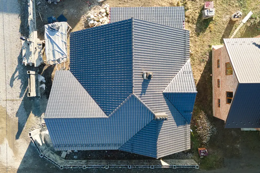 Aerial view of new homes with gray tile roofs