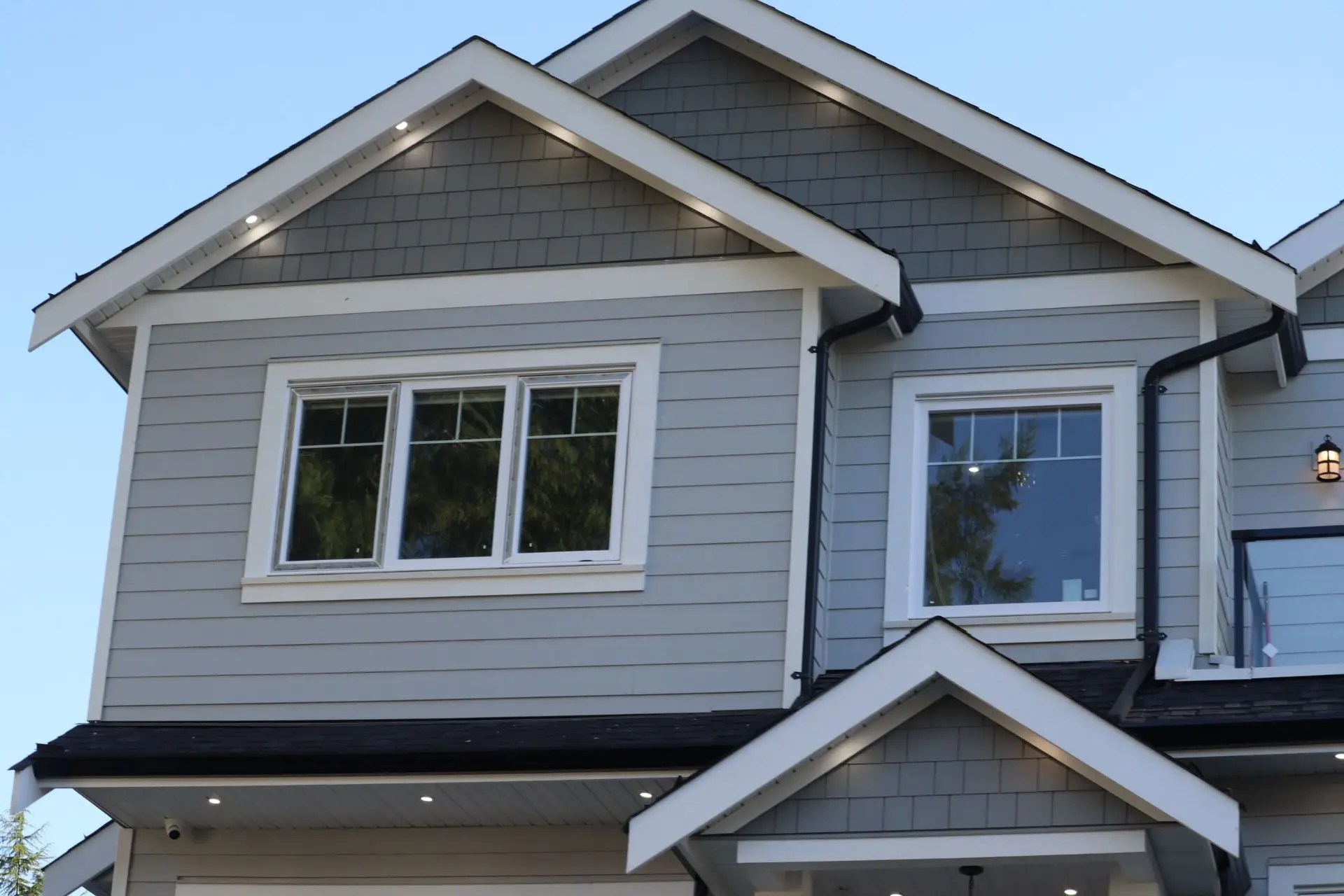 Two-story home with gray lap siding and white trim
