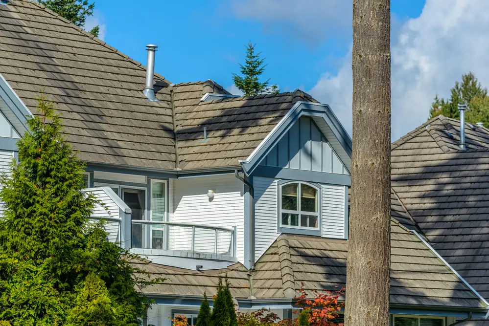 Home with a gray roof and white trim
