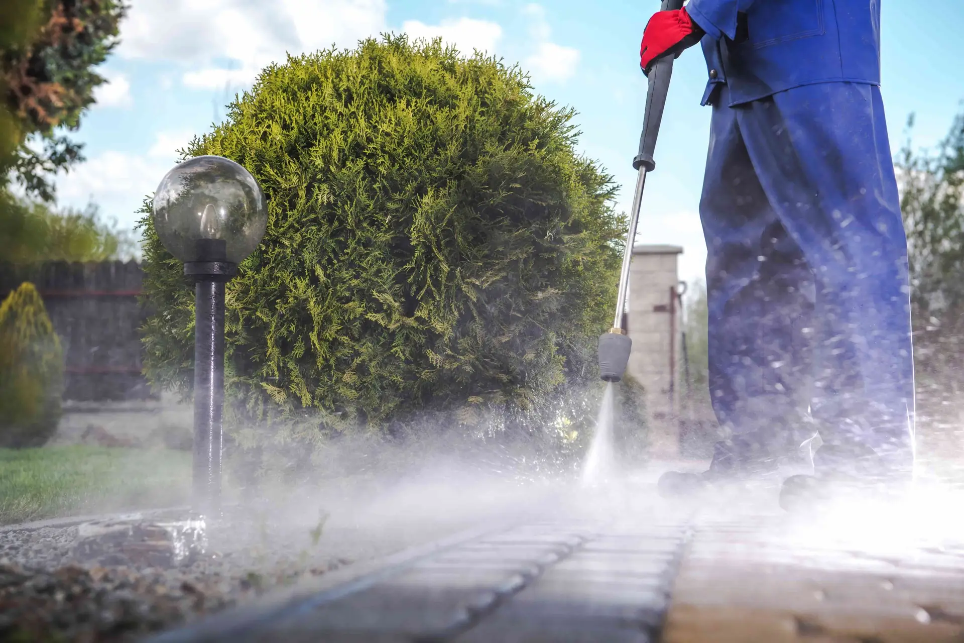 Pressure washing a stone path